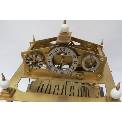 8063 - A Congreve Clock under glass case on stand with key, two steel balls and a single volume 