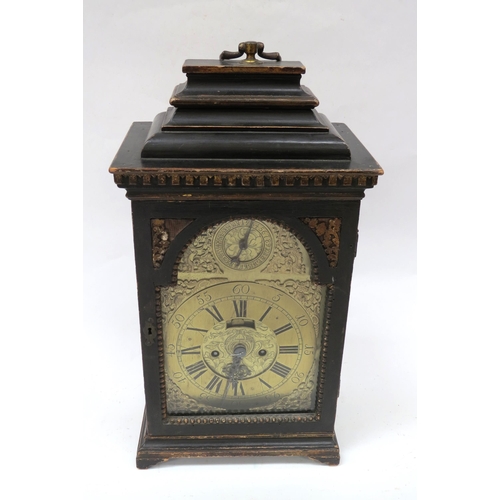 8065 - An 18th Century bracket clock in ebonised case. Roman brass chapter ring with applied spandrels and ... 