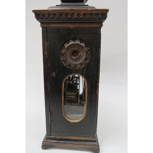 8065 - An 18th Century bracket clock in ebonised case. Roman brass chapter ring with applied spandrels and ... 