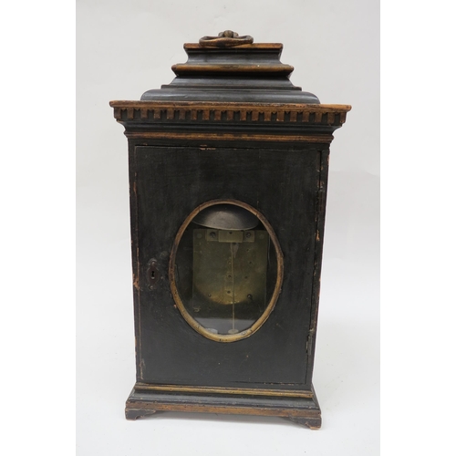 8065 - An 18th Century bracket clock in ebonised case. Roman brass chapter ring with applied spandrels and ... 