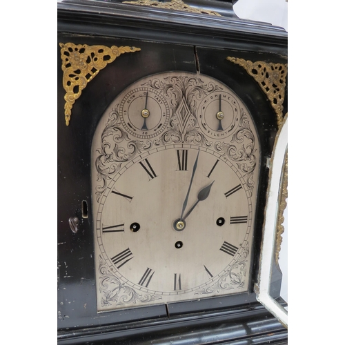 8070 - A 19th Century ebonised bracket clock of large proportions, silvered arched dial with Roman numerals... 