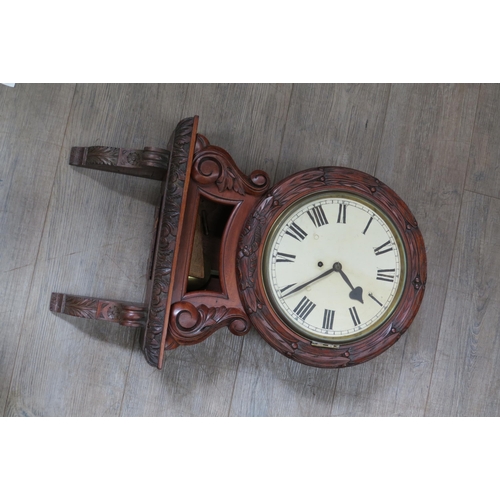 8073 - A 19th Century cased English fusee timepiece on integrated wall bracket. Roman painted dial, cast br... 