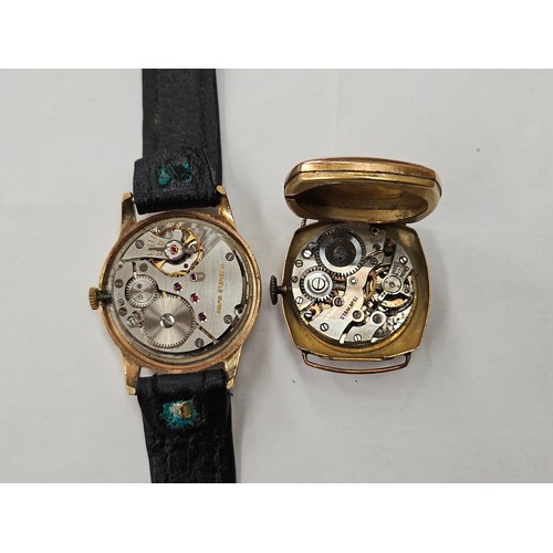 8120A - Two 9ct gold cased wristwatches, one Vertex Revue on leather strap