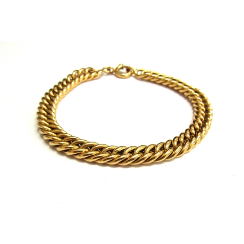 9040 - A gold bracelet, marks indistinct, 22cm long, 15.9g