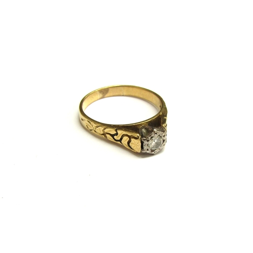 9112 - An 18ct gold ring with single diamond in illusion setting, patterned shoulders. Size R, 4.5g