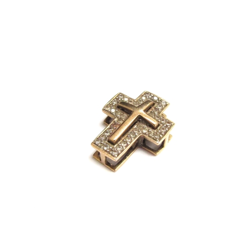 9113 - A gold cross pendant studded with diamonds, stamped 9k, 4.6g