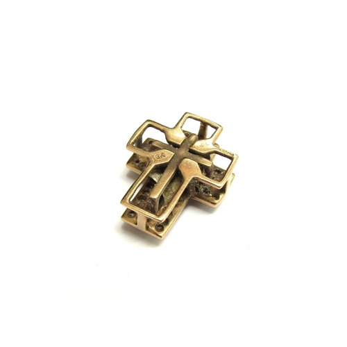 9113 - A gold cross pendant studded with diamonds, stamped 9k, 4.6g