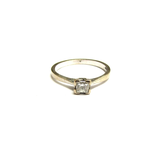 9048 - An 18ct white gold ring set with a square diamond, 0.25ct approx. Size M/N, 2.6g