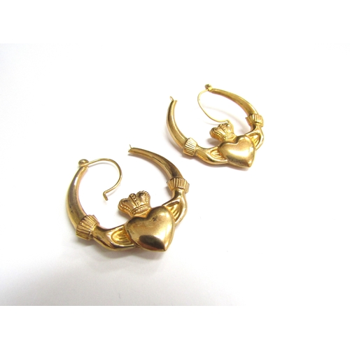 9125 - A pair of 9ct gold hoop earrings depicting the Claddagh symbol, 2.7g