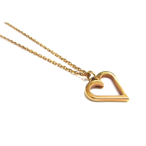 9460 - An 18ct gold open heart pendant hung on an 18ct gold chain,  46cm long, 6.9g