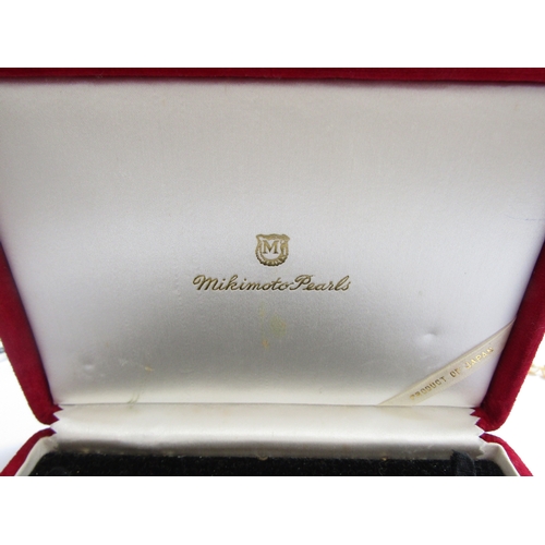 9126 - A single strand graduated pearl necklace, 44cm long, not marked in a Mikimoto box