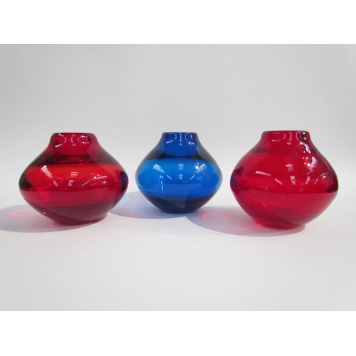 7204 - Three Whitefriars optic vases designed by Geoffrey Baxter, No.9586 in Ruby and Kingfisher Blue. 13.5... 