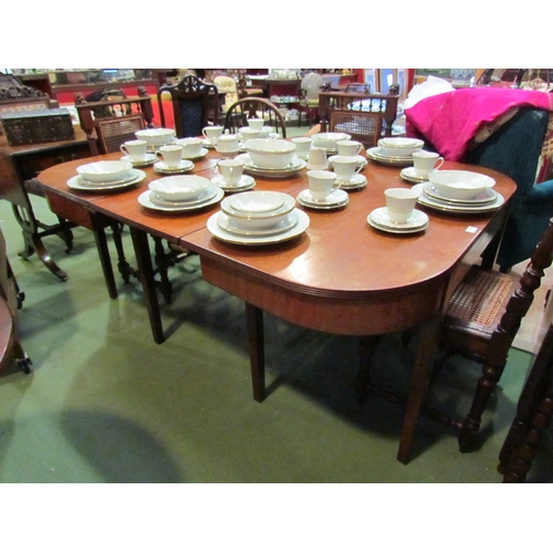 4166 - A George III mahogany D-end dining table with extra leaf, the reeded edge top and brass handle, rear... 