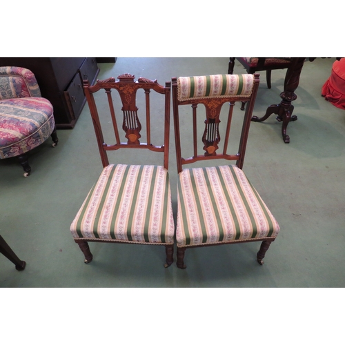 4167 - Two Edwardian inlaid rosewood music chairs, lyre form backrest, bugle and lyre inlay decoration and ... 