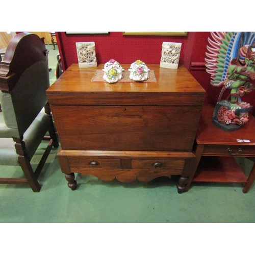 4201 - A late Victorian Anglo-Indian teak chest on base, the hinged lid over two drawers and turned legs jo... 