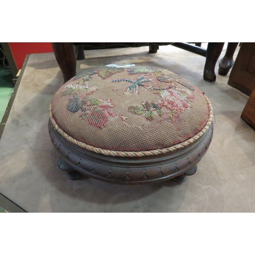 4227 - A Victorian beaded tapestry footstool, 30cm diameter, a/f