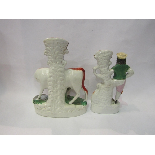 4243 - A Victorian Staffordshire cow group, 27cm tall, Victorian Staffordshire shepherd spill vase and Vict... 