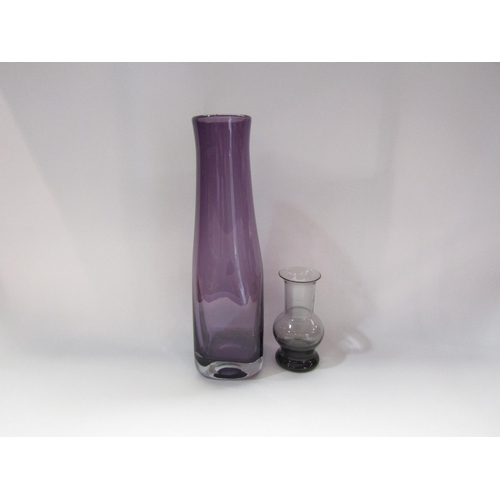 4247 - A large amethyst glass vase, 35cm tall, and a Wedgwood smoked grey glass vase, 14cm tall (2)  (R) £1... 