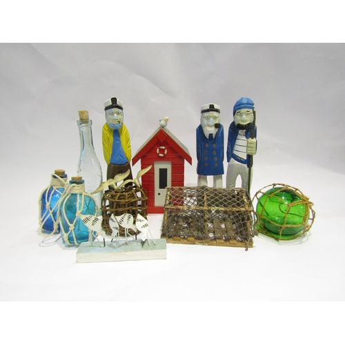 4275 - Decorative seaside figures including beach hut, fisherman, etc. (11)