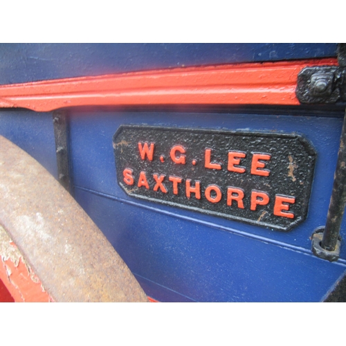 3602 - A two wheel tipping tumbril with iron name plate; W.G.Lee, Saxthorpe, wheels need attention