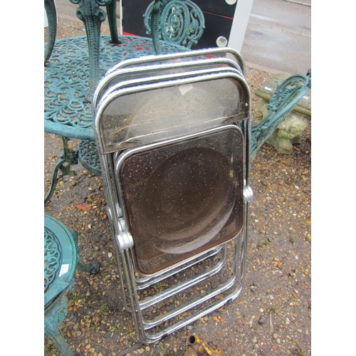 3311 - Four chrome and clear plastic Plia chairs