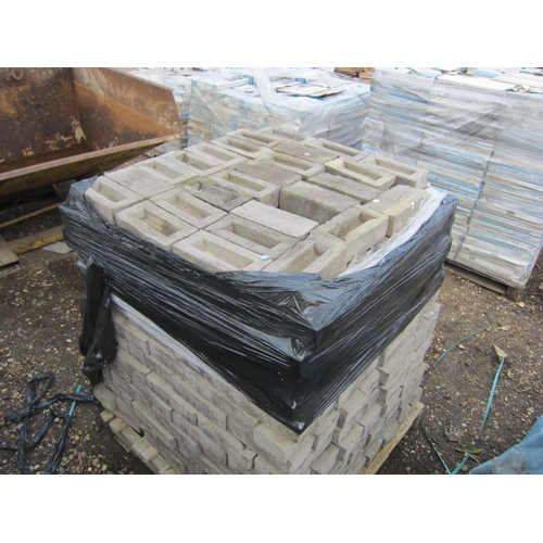 3288 - WITHDRAWN: A pallet of black bricks