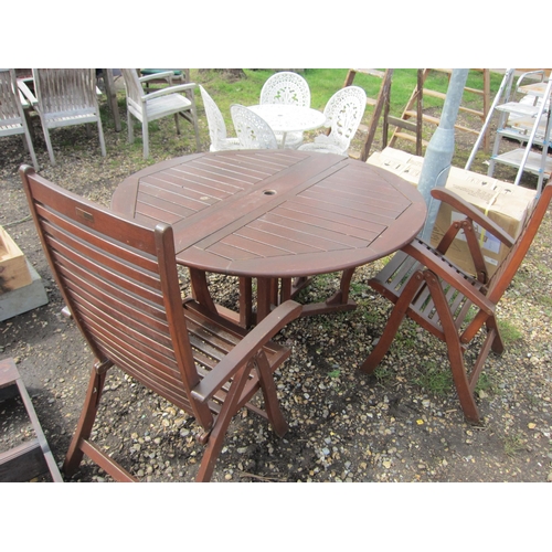 3603 - A folding hardwood garden table with two chairs and two boxed unused chairs