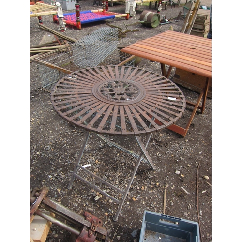 3621 - A folding strap metal garden table