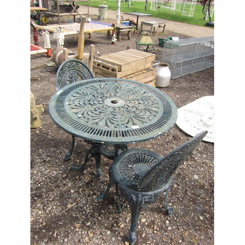 3624 - A cast alloy garden table and two chairs