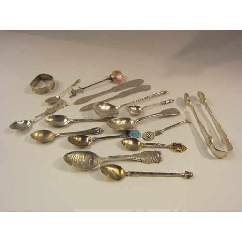 4304 - A collection of mainly silver including spoons, sugar nips and a napkin ring