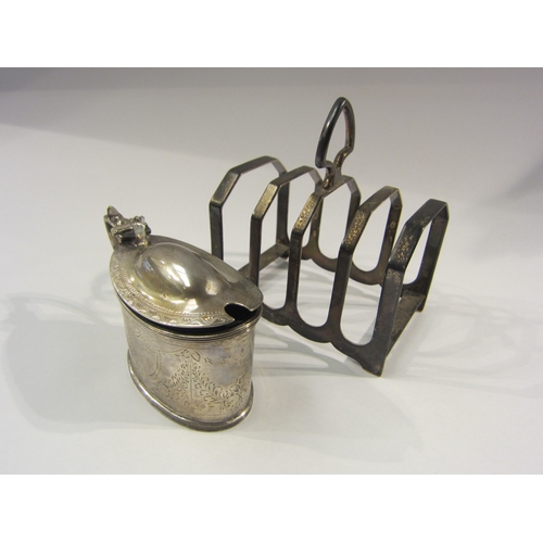 4308 - A silver mustard with blue glass liner, no spoon, and a silver toast rack (2)