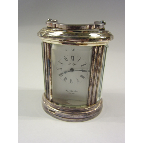 4310 - A L’Epee ‘Royal Silver Jubilee’ carriage clock, silver plated rounded case  (E)  £40-60