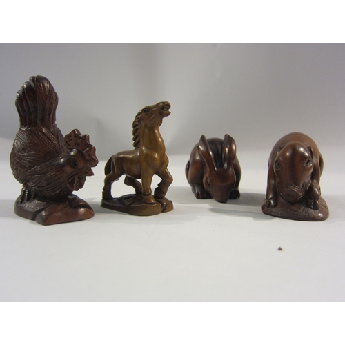 4325 - Four boxwood netsuke - cockerel, rabbit, horse, pig, all signed