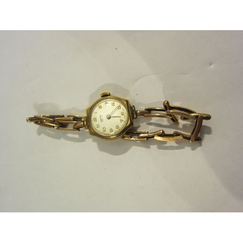 4338 - A 9ct gold cased Vertex Revue lady's wristwatch with rose gold coloured strap