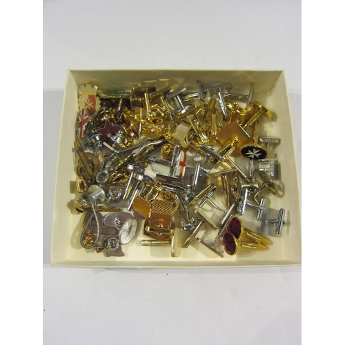 4356 - A box of costume gentleman's cuff links, tie pins and badges