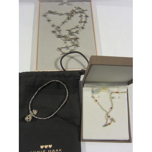 4357 - An Annie Haak 925 bracelet, Annie Haak coloured bead spaced necklace, and an abstract silver necklac... 