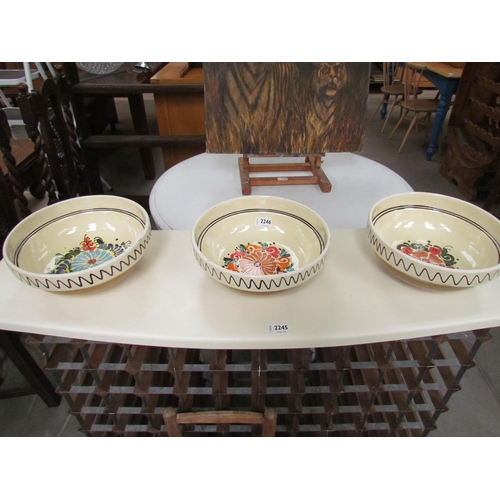 2389 - Three glazed pottery bowls with floral design    (C)