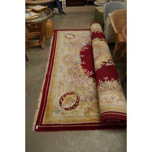 2520 - A large red and cream Chinese carpet    (R)  £70