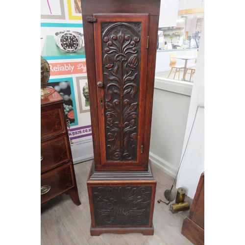 4427 - Circa 1830, An oak cased longcase clock with brass dial and chapter ring, with barley twist to hood.... 