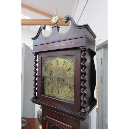 4427 - Circa 1830, An oak cased longcase clock with brass dial and chapter ring, with barley twist to hood.... 