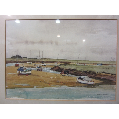 4022 - IRENE PRESSWOOD (XX): A pair of watercolours of coastal scenes including ‘Aground at Low Tide’, 32cm... 