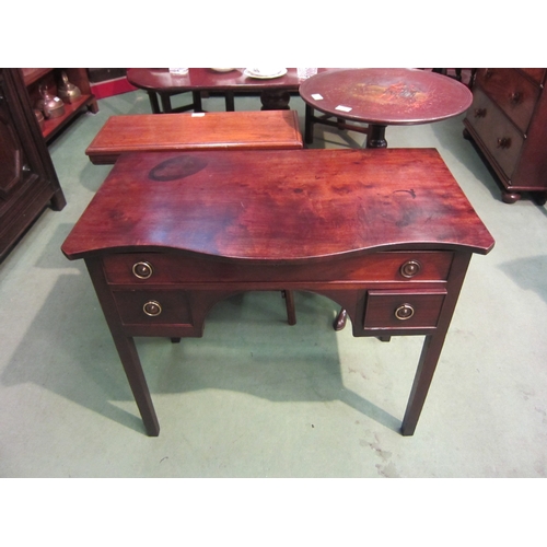 4070 - A George III flame mahogany serpentine front top lowboy/side table over a single long and two short ... 