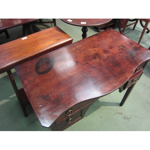 4070 - A George III flame mahogany serpentine front top lowboy/side table over a single long and two short ... 