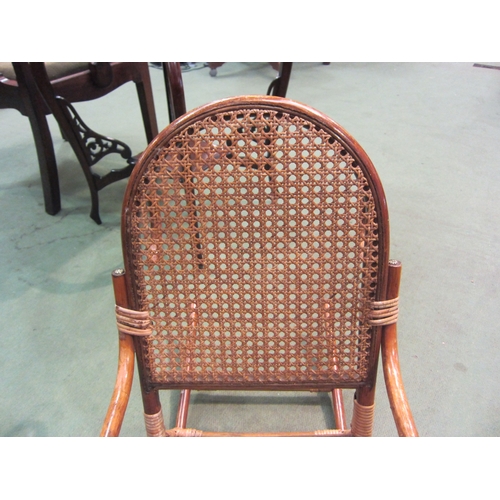 4090 - A child's bamboo rocking chair with cane seat and back rest   (R) £55