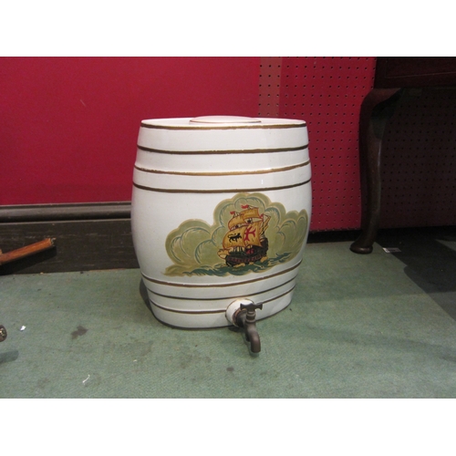 4091 - A ceramic spirit barrel with tap, ship decoration