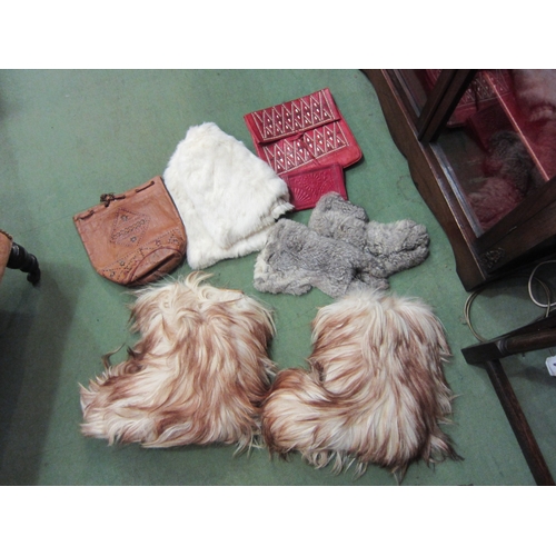 4122 - A suitcase of various fashion including 1970's Apollo Saba fur boots, stoles, rabbit fur gloves, etc... 