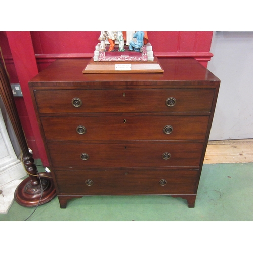 4159 - A Circa 1850 mahogany chest of four graduating long drawers on bracket feet, 89cm tall x 92cm wide x... 