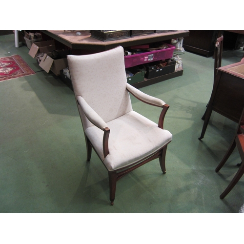 4160 - An Edwardian armchair, cream foliate design upholstery, on tapering legs to castors   (E) £20-30