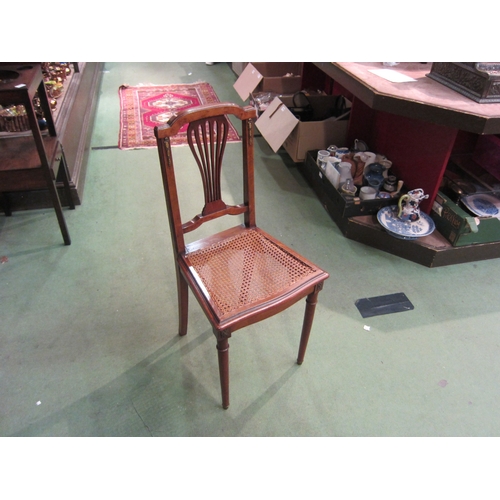 4161 - A French 19th Century walnut chair with ormolu mounts, the pierced central spat back rest over a can... 