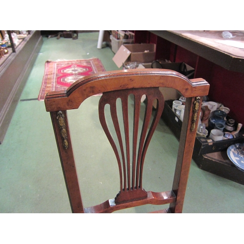 4161 - A French 19th Century walnut chair with ormolu mounts, the pierced central spat back rest over a can... 